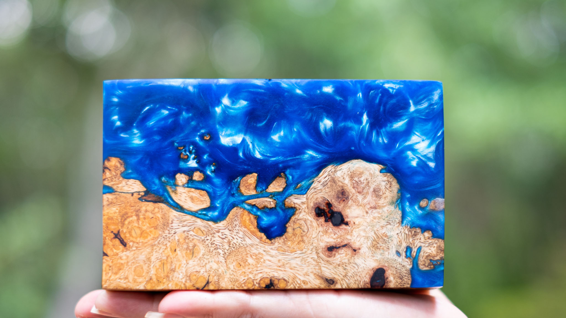 Wood and resin block with blue iridescent color