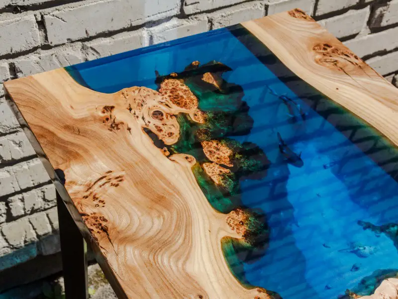 River table with clear blue resin